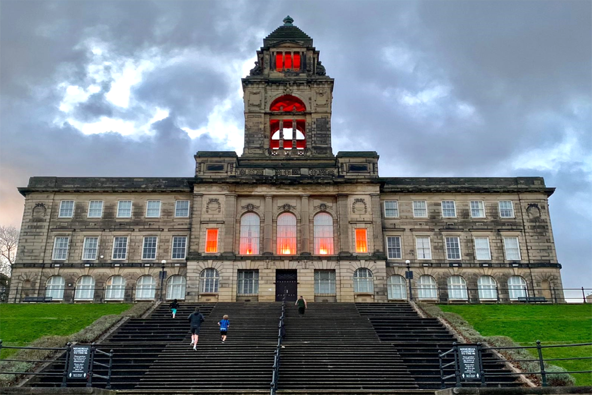 Wallasey Town Hall lit up in orange for 'Orange the World: End Violence against Women Now!'